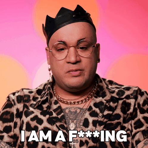 A Man Wearing Glasses And A Crown Says I Am A F * * * Ing GIF