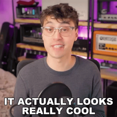 A Man Wearing Glasses And A Gray Shirt Says It Actually Looks Really Cool GIF