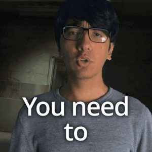 A Man Wearing Glasses And A Gray Shirt Says You Need To GIF