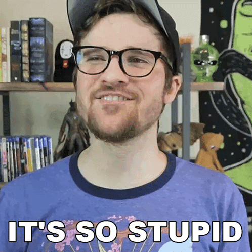 A Man Wearing Glasses And A Hat Is Smiling And Says It 'S So Stupid GIF