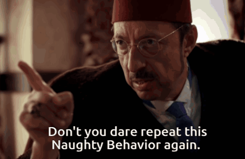 A Man Wearing Glasses And A Hat Says " Don T You Dare Repeat This Naughty Behavior Again " GIF