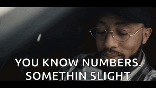 A Man Wearing Glasses And A Hat Says " You Know Numbers Somethin Slight " GIF