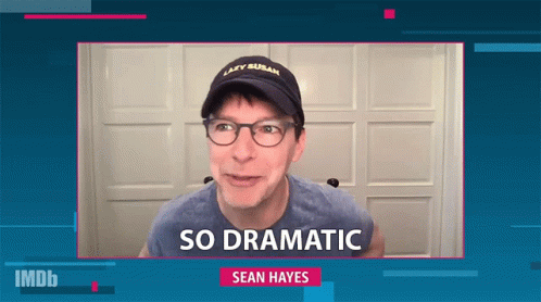 A Man Wearing Glasses And A Hat That Says Lazy Susan On It GIF