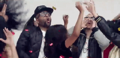 A Man Wearing Glasses And A Hat That Says ' Supreme ' On It GIF