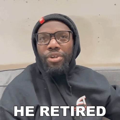 a man wearing glasses and a hooded sweatshirt says he retired