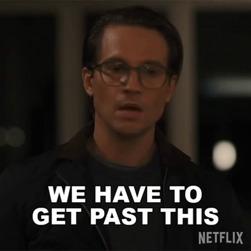 A Man Wearing Glasses And A Jacket Is Saying We Have To Get Past This . GIF