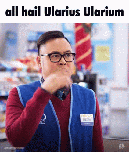 A Man Wearing Glasses And A Name Tag That Says Mateo Is Making A Funny Face GIF