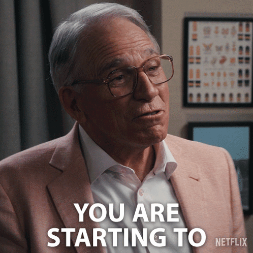 A Man Wearing Glasses And A Pink Suit Says You Are Starting To Netflix GIF