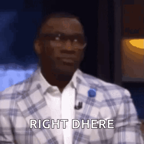 A Man Wearing Glasses And A Plaid Jacket Is Saying Right There GIF