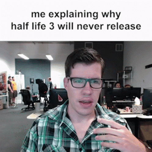 A Man Wearing Glasses And A Plaid Shirt Explaining Why Half Life 3 Will Never Release GIF