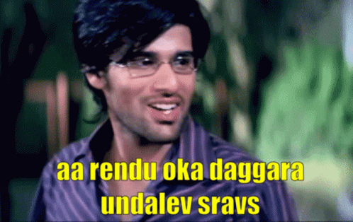 A Man Wearing Glasses And A Purple Shirt Says Aa Rendu Oka Daggara GIF