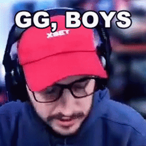 A Man Wearing Glasses And A Red Hat With The Words Gg Boys On It GIF