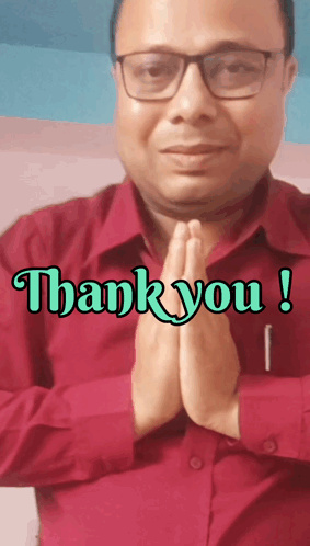 A Man Wearing Glasses And A Red Shirt Says " Thank You " GIF
