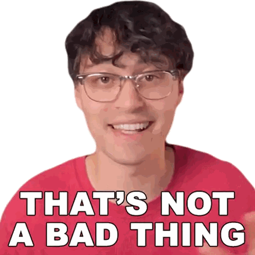 a man wearing glasses and a red shirt with the words that 's not a bad thing on it