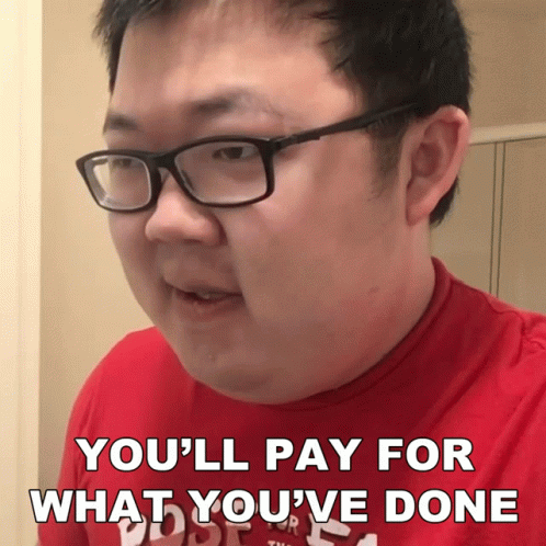 a man wearing glasses and a red shirt with the words you 'll pay for what you 've done