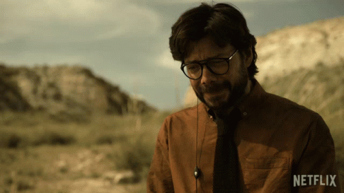 A Man Wearing Glasses And A Shirt That Says Netflix On The Front GIF
