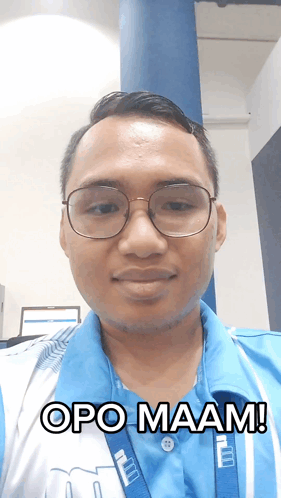 A Man Wearing Glasses And A Shirt That Says Opo Maam On It GIF