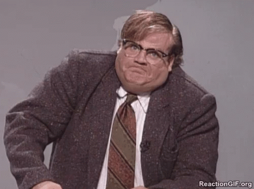 A Man Wearing Glasses And A Suit Has A Reaction Gif.org Watermark GIF