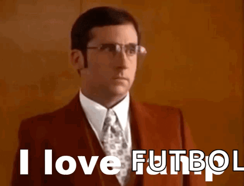 A Man Wearing Glasses And A Suit Says I Love Futbol GIF