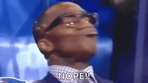 A Man Wearing Glasses And A Suit Says Nope . GIF