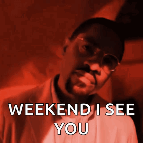 A Man Wearing Glasses And A Suit Says " Weekend I See You " GIF