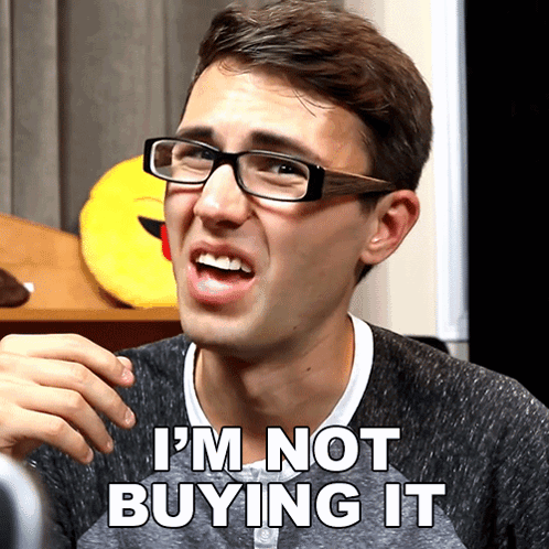 A Man Wearing Glasses And A Sweater Says I 'M Not Buying It GIF