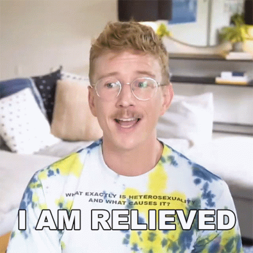 A Man Wearing Glasses And A Tie Dye Shirt Is Saying I Am Relieved GIF