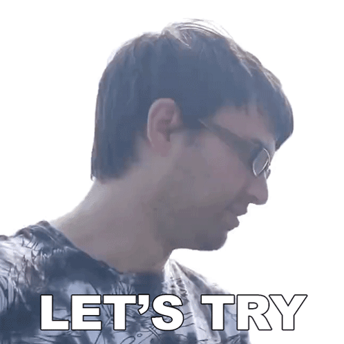 A Man Wearing Glasses And A Tie Dye Shirt Says " Let 'S Try " GIF