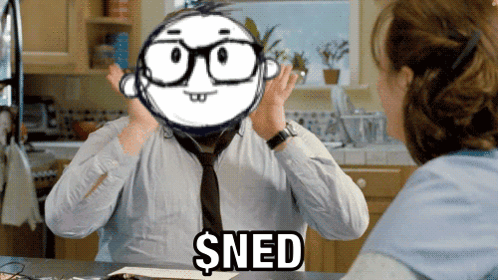 A Man Wearing Glasses And A Tie Has A Cartoon Face On His Head That Says Sned GIF