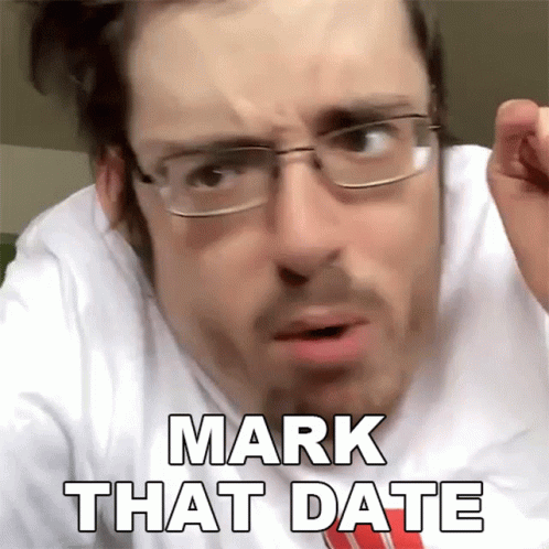 A Man Wearing Glasses And A Tie Says Mark That Date GIF