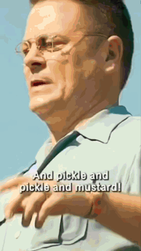 A Man Wearing Glasses And A Tie With The Words " And Pickle And Pickle And Mustard " Below Him GIF