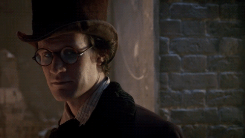 a man wearing glasses and a top hat says what 's wrong with silly ?