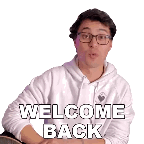 a man wearing glasses and a white hoodie is saying welcome back