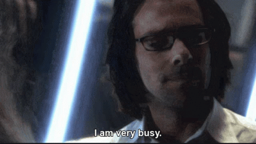 Man With Glasses Says I Am Very Busy GIF