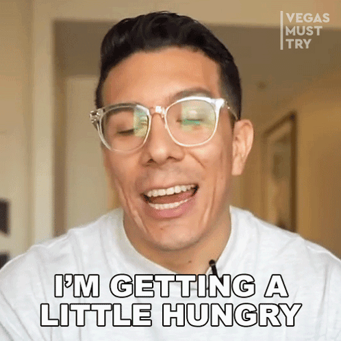 A Man Wearing Glasses And A White Shirt Says I 'M Getting A Little Hungry GIF
