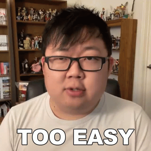 A Man Wearing Glasses And A White Shirt With The Words Too Easy On It GIF