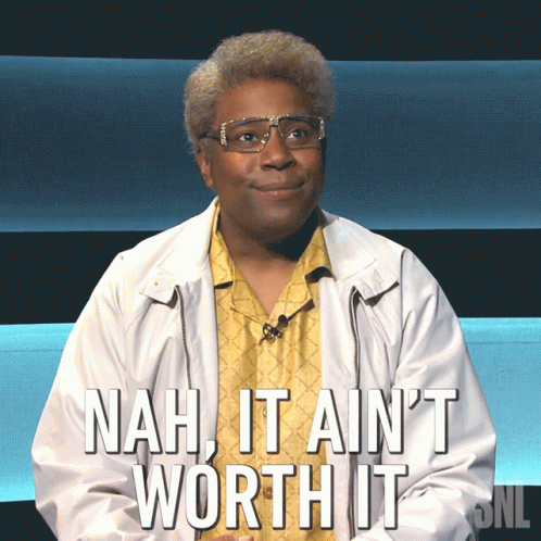 A Man Wearing Glasses And A Yellow Shirt Says Nah It Ain T Worth It GIF