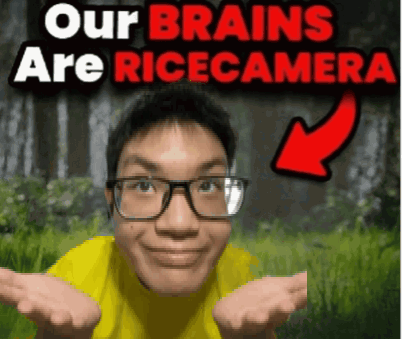 A Man Wearing Glasses And A Yellow Shirt With The Words " Our Brains Are Ricecamera " Behind Him GIF