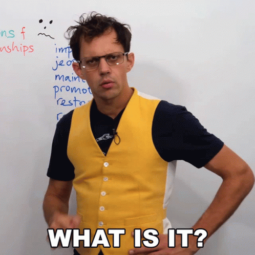 A Man Wearing Glasses And A Yellow Vest Asks What Is It GIF