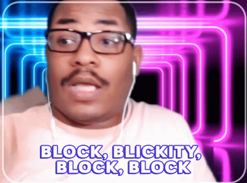 A Man Wearing Glasses And Ear Buds Says " Block Blickity Block Block " GIF