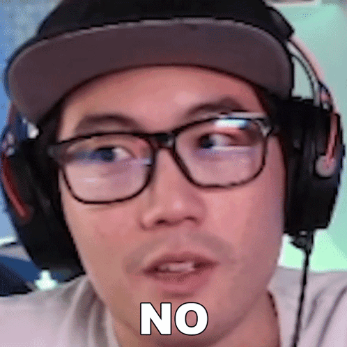 a man wearing glasses and headphones has the word no written on his face