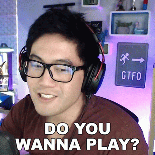 A Man Wearing Glasses And Headphones Is Asking If He Wanna Play GIF
