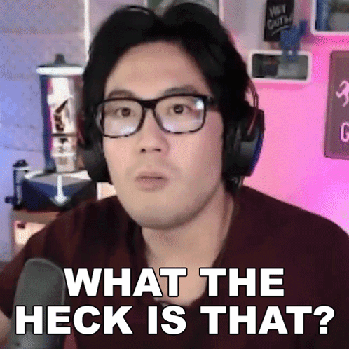 A Man Wearing Glasses And Headphones Is Asking What The Heck Is That GIF