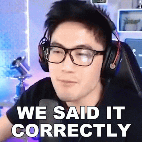 A Man Wearing Glasses And Headphones Says We Said It Correctly In Front Of A Microphone GIF