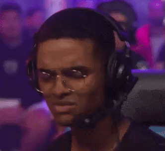 A Man Wearing Glasses And Headphones With A Microphone . GIF