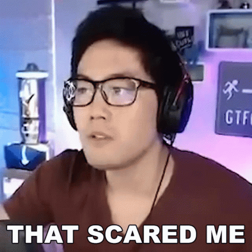 A Man Wearing Glasses And Headphones With The Words That Scared Me Above Him GIF