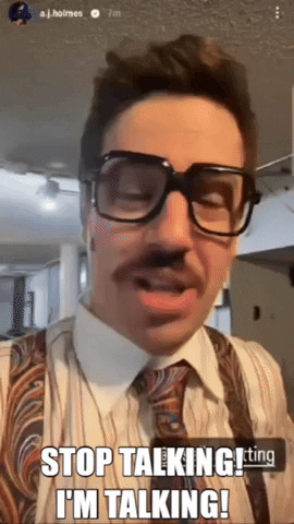 A Man Wearing Glasses And Suspenders Says " Stop Talking I 'M Talking " GIF