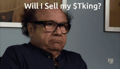 A Man Wearing Glasses Is Asking If He Will Sell His $ Tking GIF