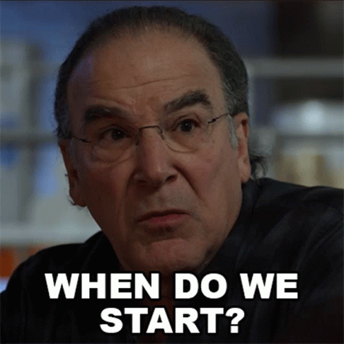 A Man Wearing Glasses Is Asking When Do We Start GIF