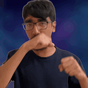 A Man Wearing Glasses Is Covering His Mouth With His Hand GIF